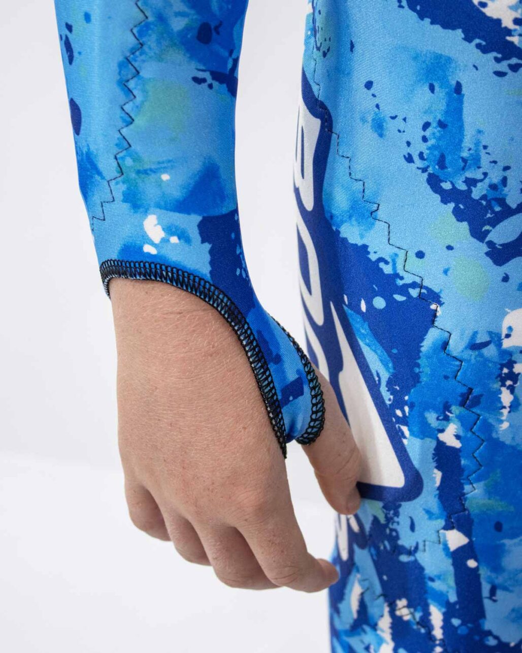 Youth Alpine Race Suit Thumb strap detail.