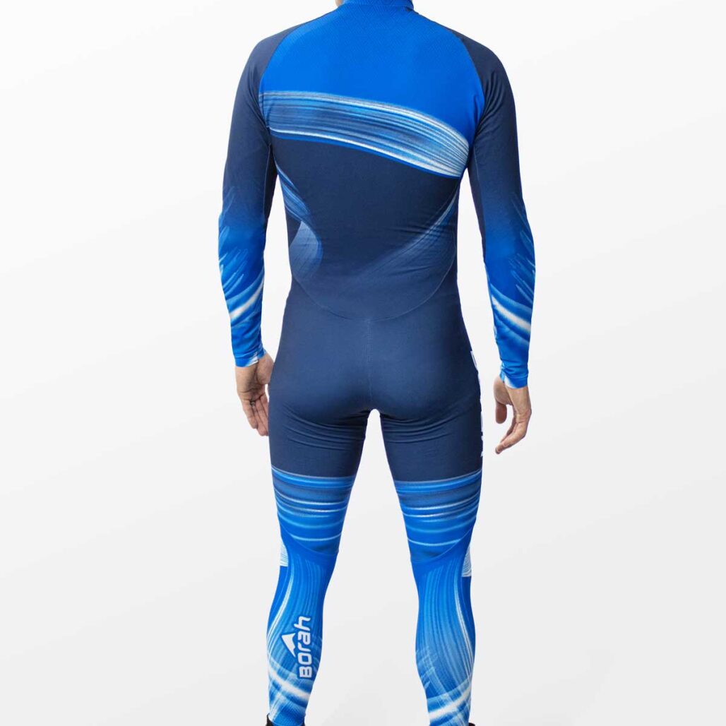 Model posing in the Men's OTW One Piece XC Suit back view.