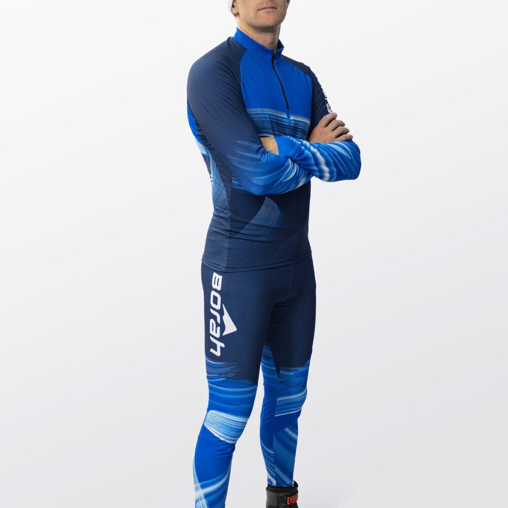 Model posing in the Men's OTW XC Suit front view.