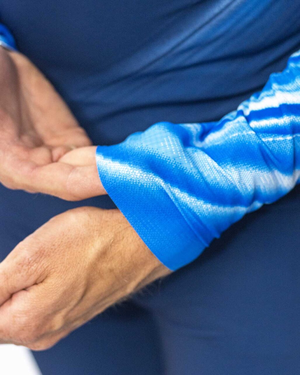 Lzer Cut sleeves on the Men's OTW XC Suit.