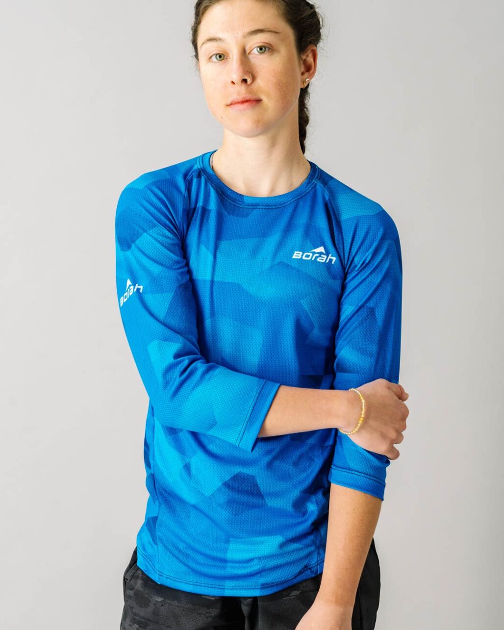 Front facing photo of a female wearing the new Women's Pro 3/4 Sleeve Freeride MTB Jersey.