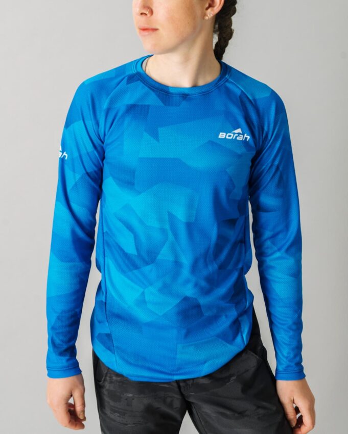 Front facing photo of a female wearing the new Women's Pro Long Sleeve Freeride MTB Jersey.