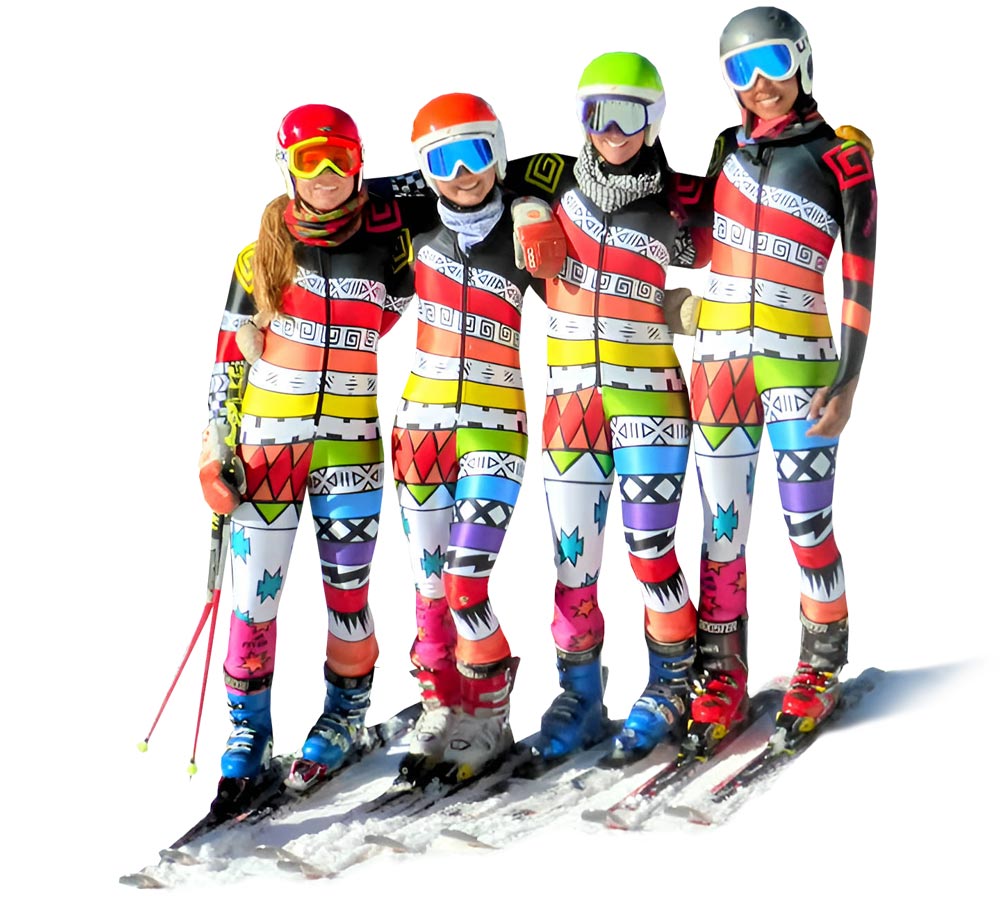 Four alpine skiers posing in their colorful custom alpine suits by Borah Teamwear.