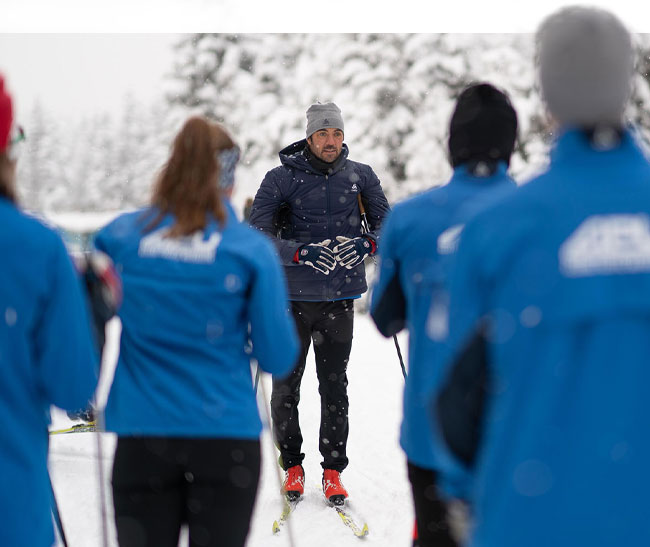 Ski Director talking with his team before training.