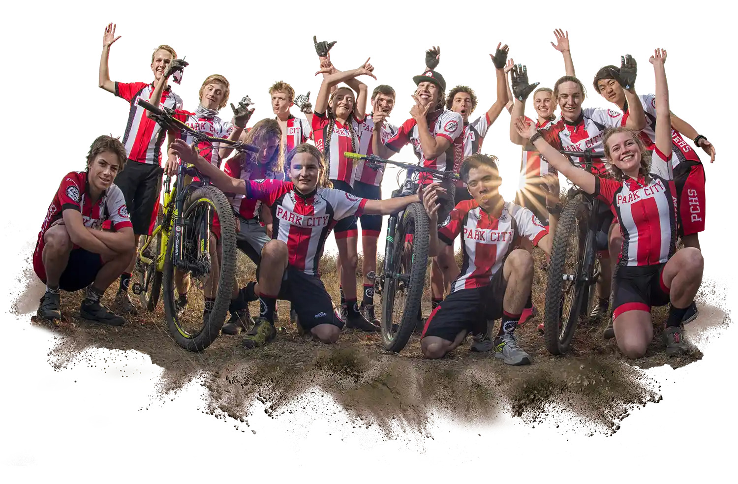 Mountain bikers posing and celebrating in a team photo.