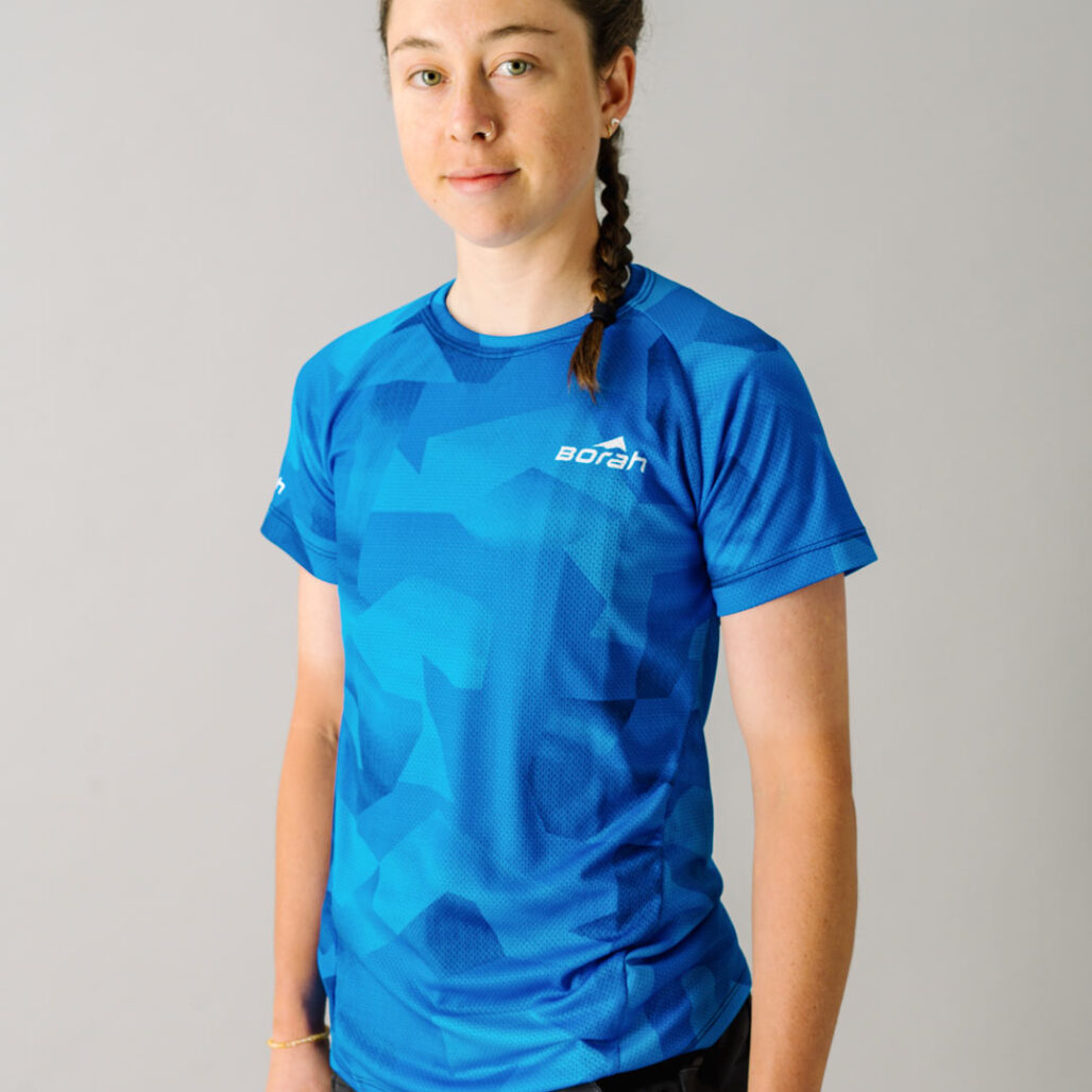 Front facing photo of a female wearing the new Women's Pro Freeride MTB Jersey.