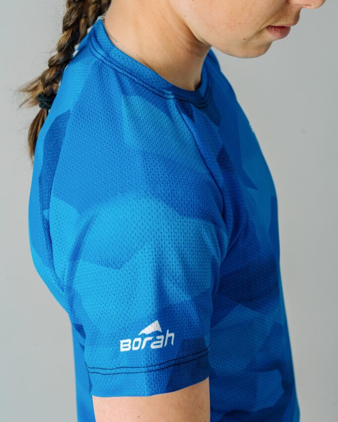 Photo of a female wearing the new Women's Pro Freeride MTB Jersey focusing on the fabric detail.